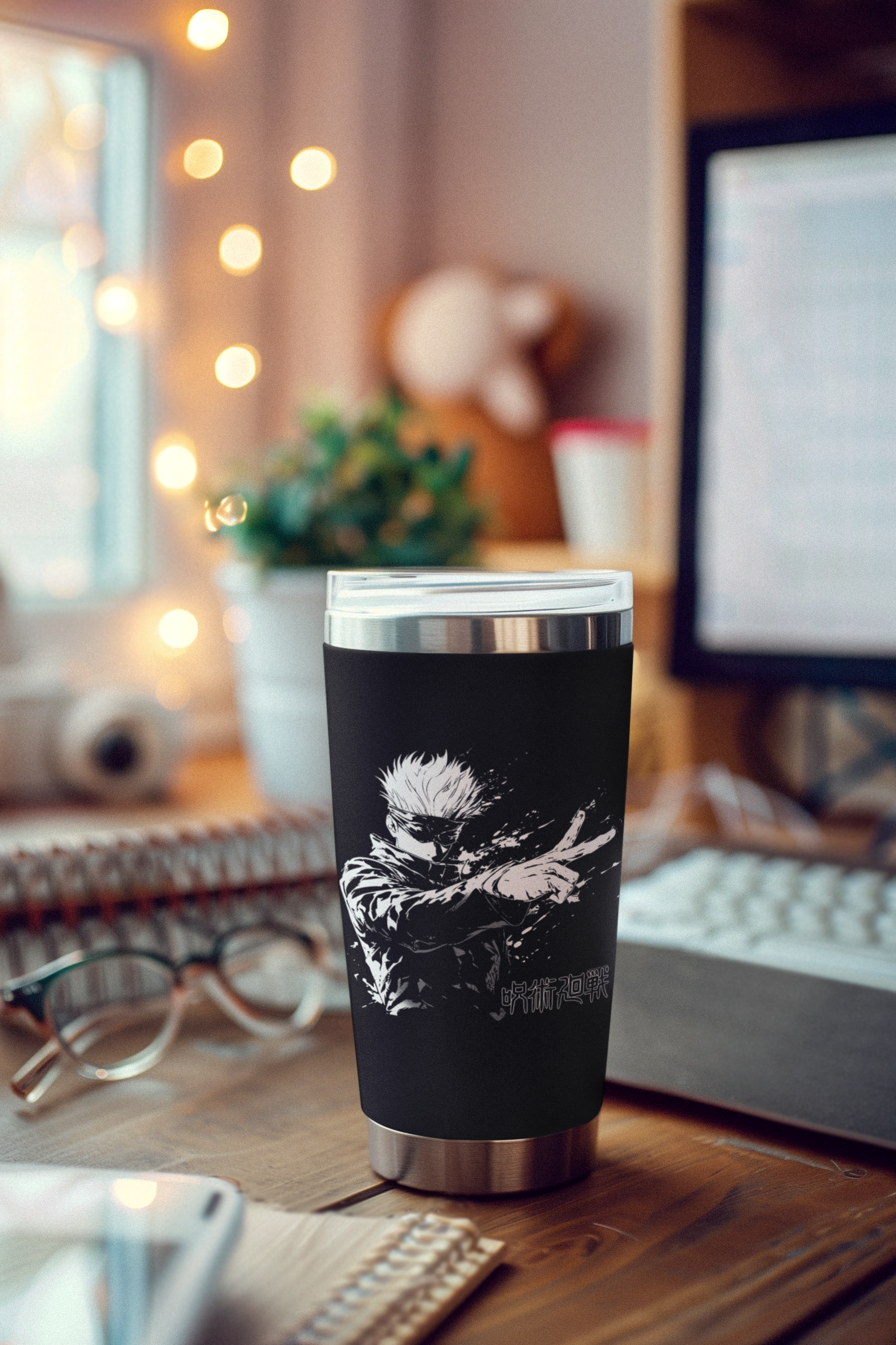 a coffee cup sitting on top of a wooden desk