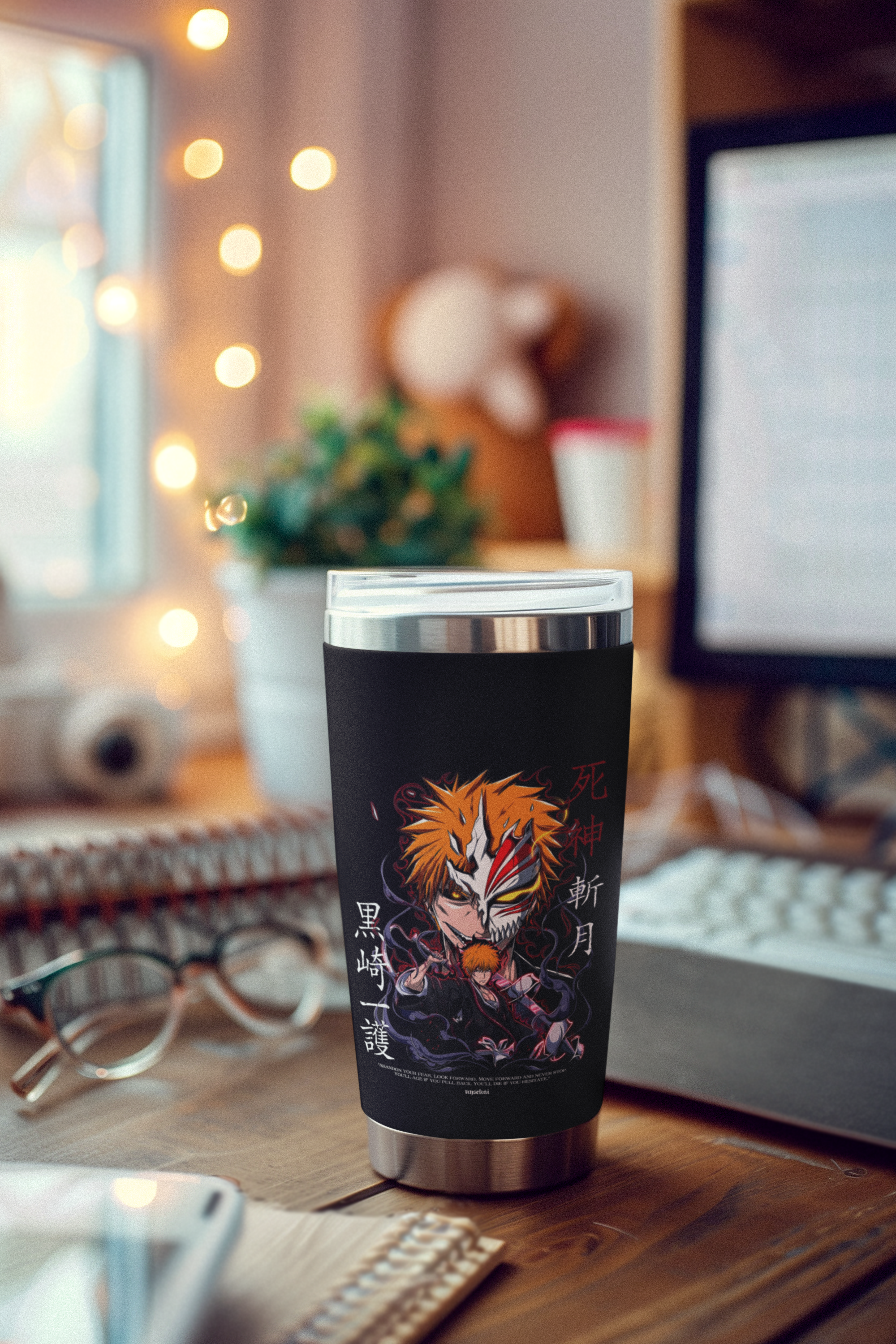 a coffee cup sitting on top of a wooden desk