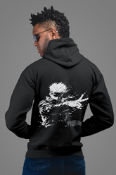 a man with dreadlocks wearing a black hoodie