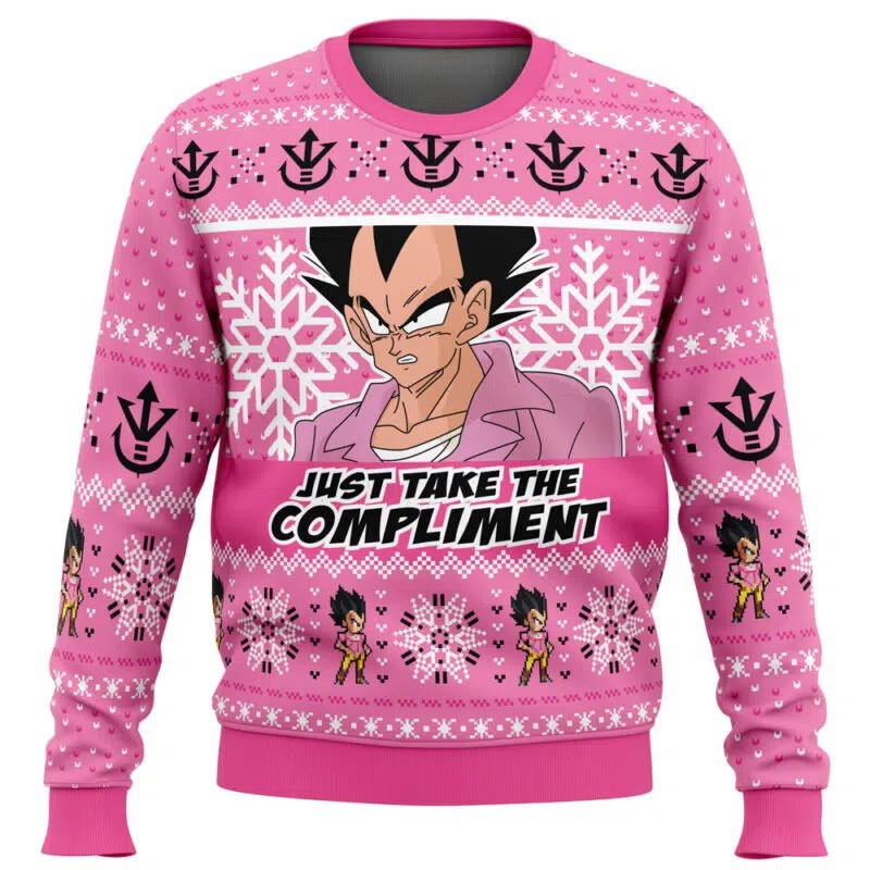 Pink sweater with character design and text 'Just Take the Compliment' on a white background