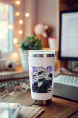 a cup sitting on top of a wooden desk