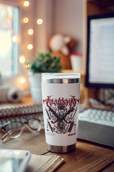 a coffee cup sitting on top of a wooden desk