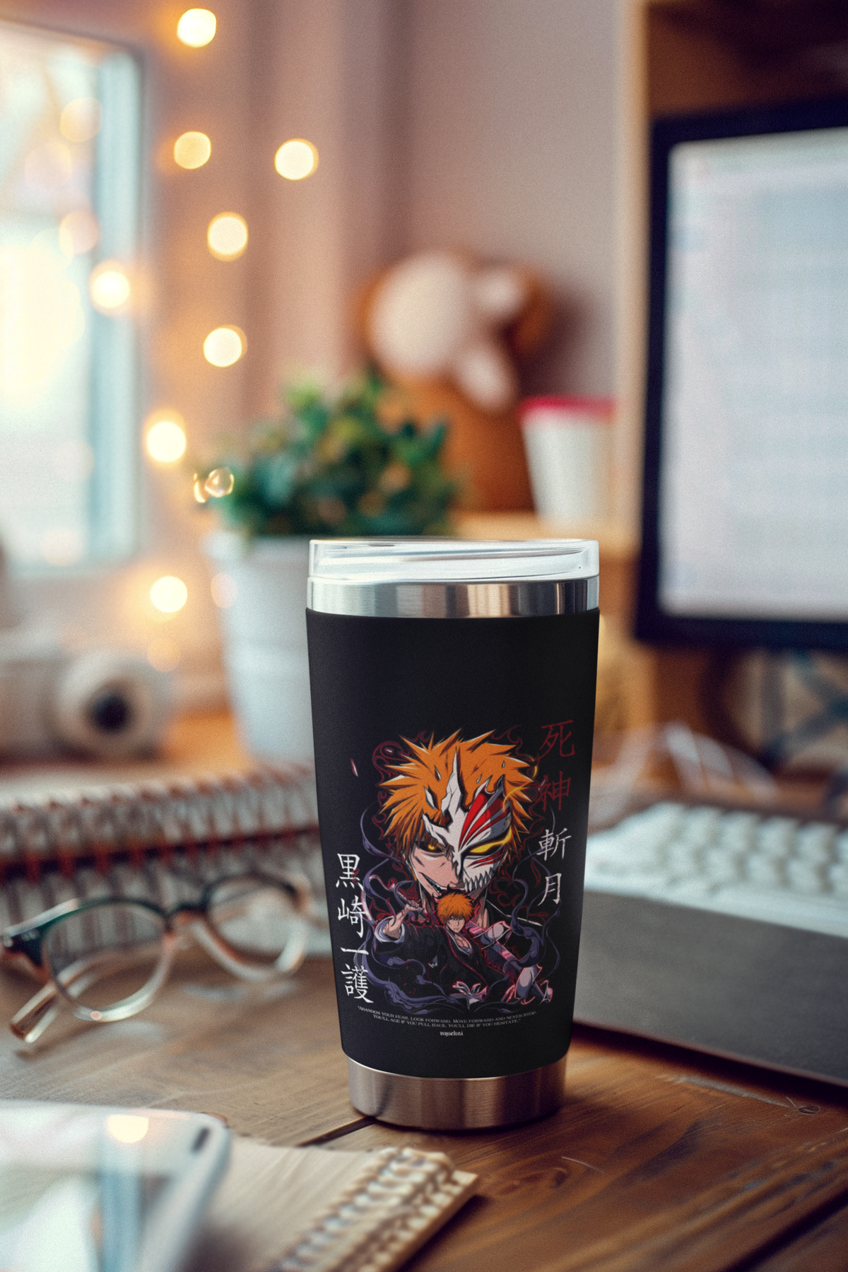 a coffee cup sitting on top of a wooden desk