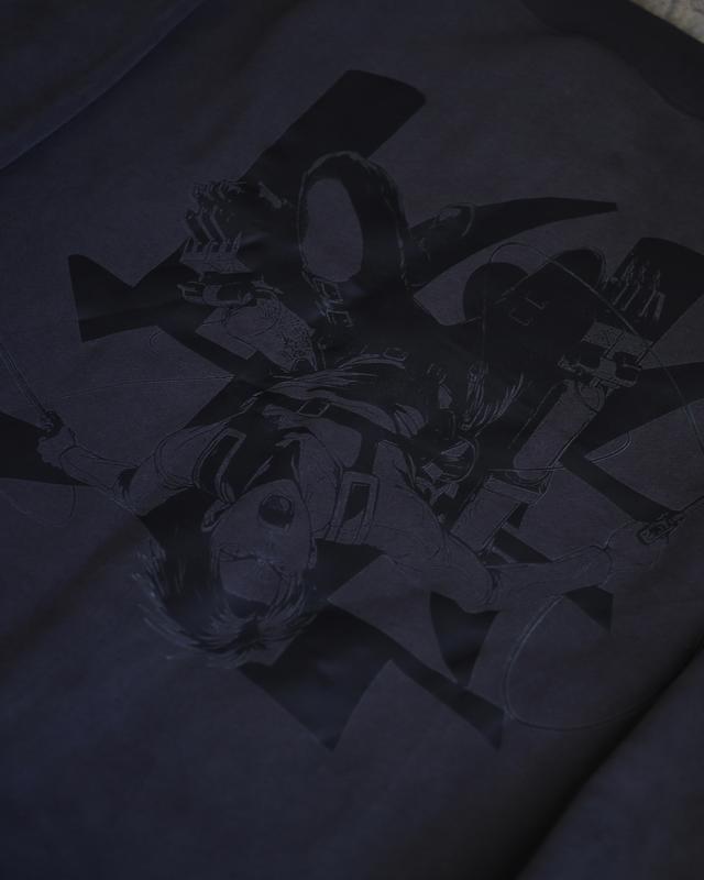 a black t - shirt with a picture of an anime character on it